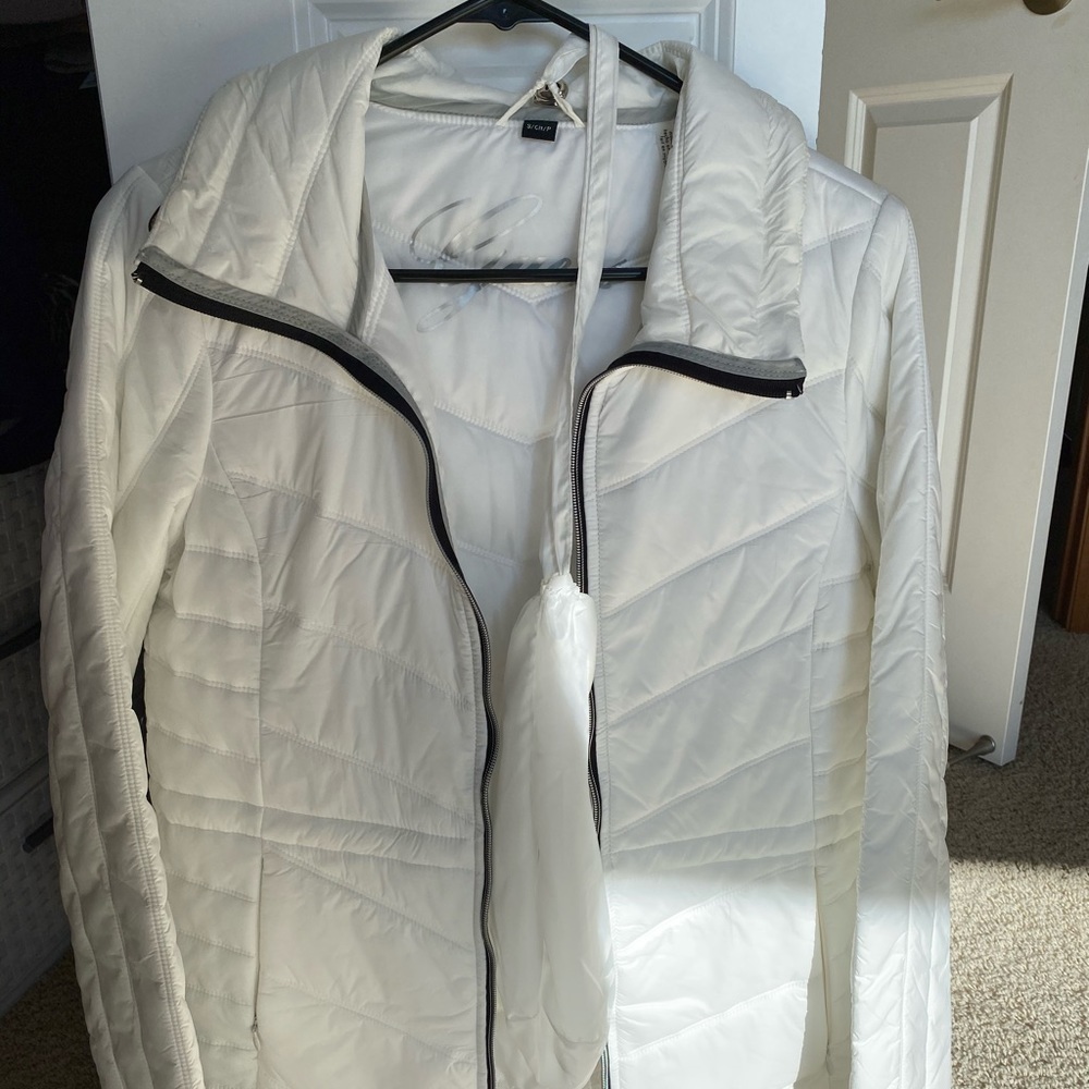 white windbreaker/ jacket
